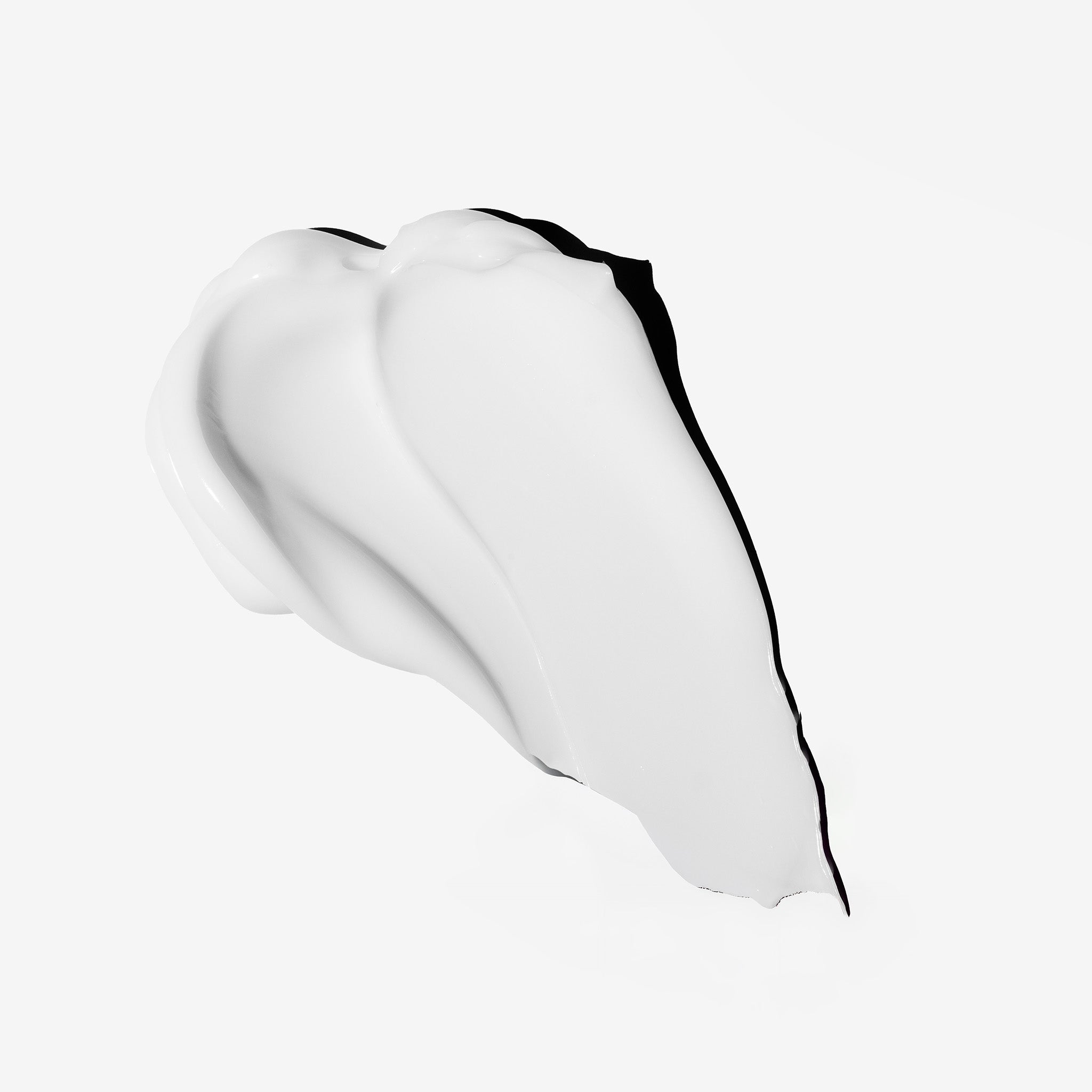 Vitamin E Barrier Boost Cream - The Body Shop texture shot on white background